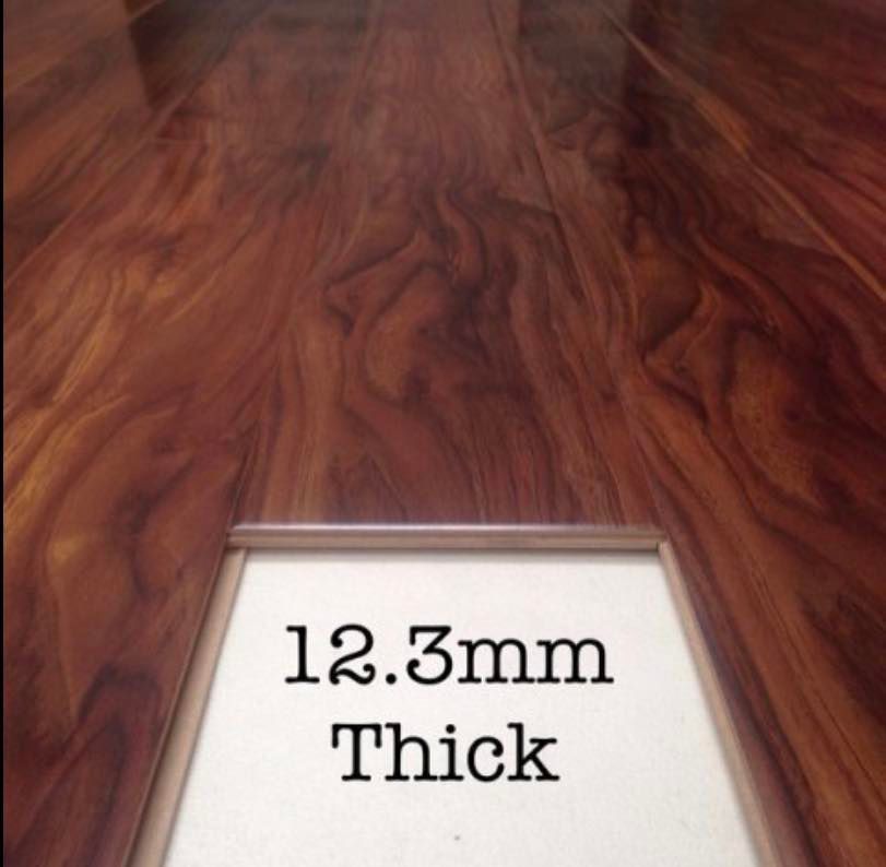High Gloss Laminated Flooring – Calgary Walnut (12mm) – 2m² Per Box