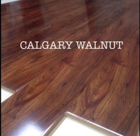 Calgary Walnut – High Gloss Laminated Flooring (12mm) – 2m² Per Box